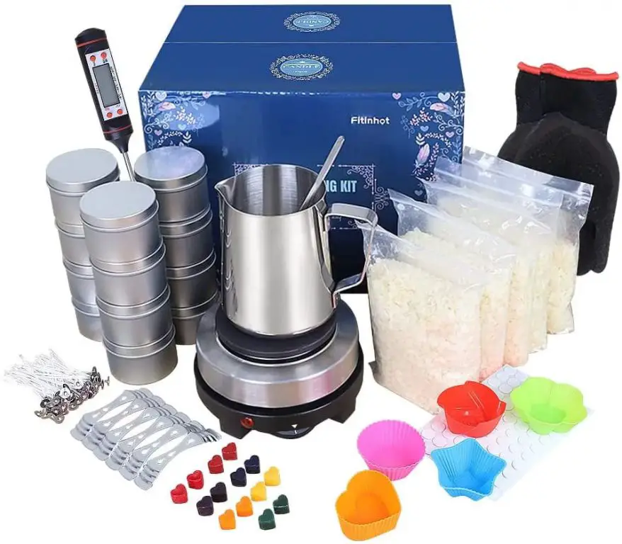 candle making equipment including wax melter, thermometer, molds, and pouring pot.