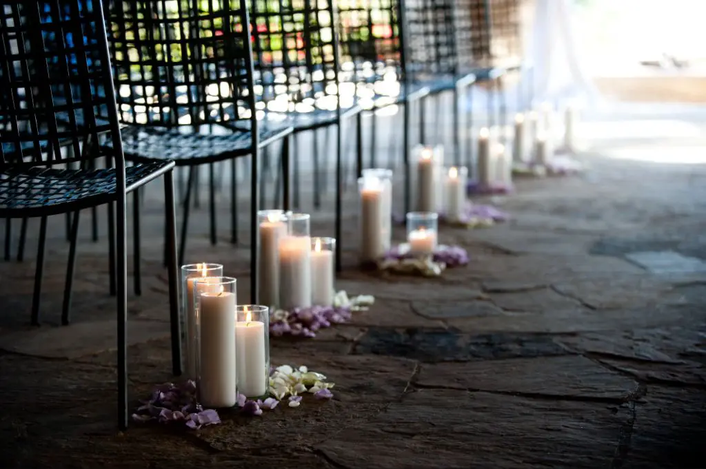 candles lining wedding aisle