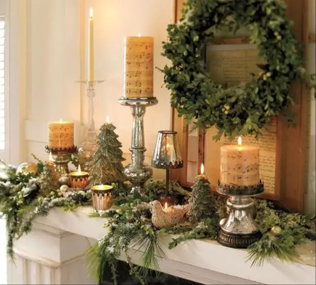 candles on a christmas mantel