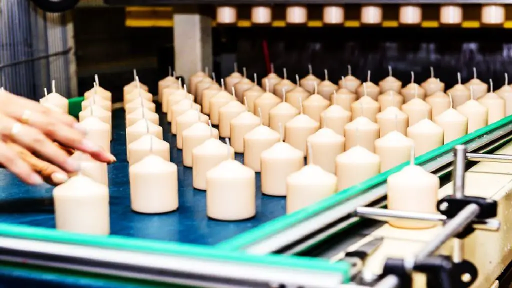 row of candles on production line