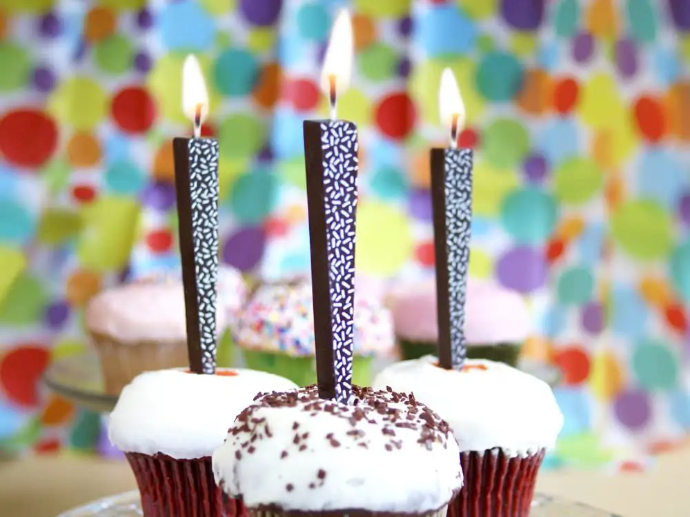 row of colorful premade edible candles for sale