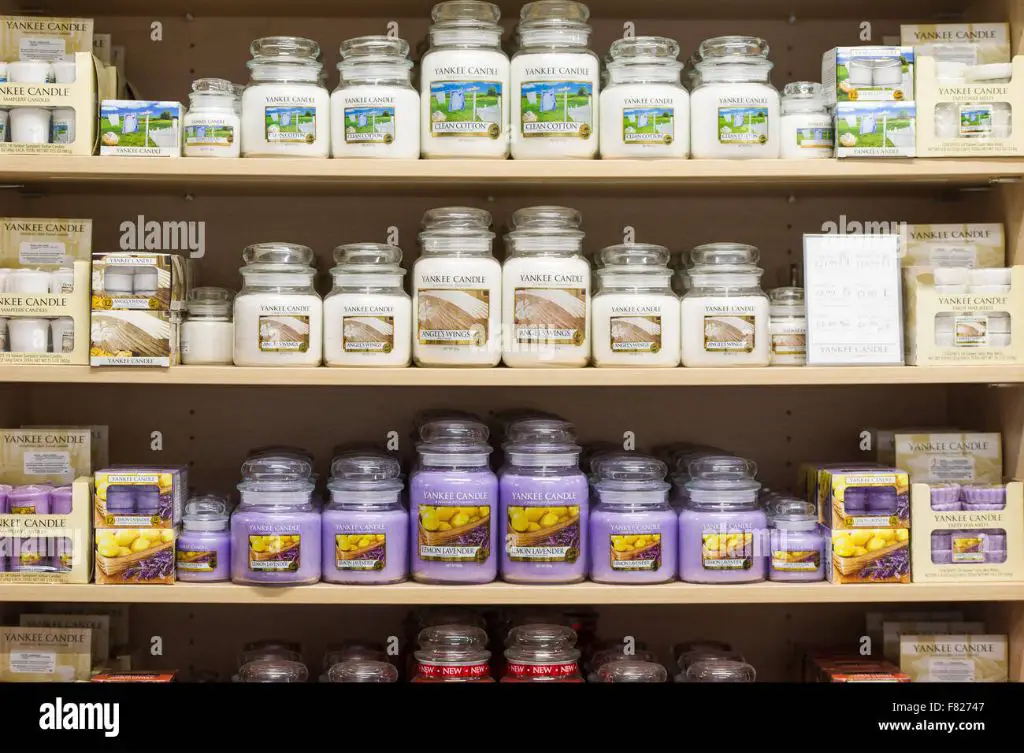 row of yankee candle jars on store shelf