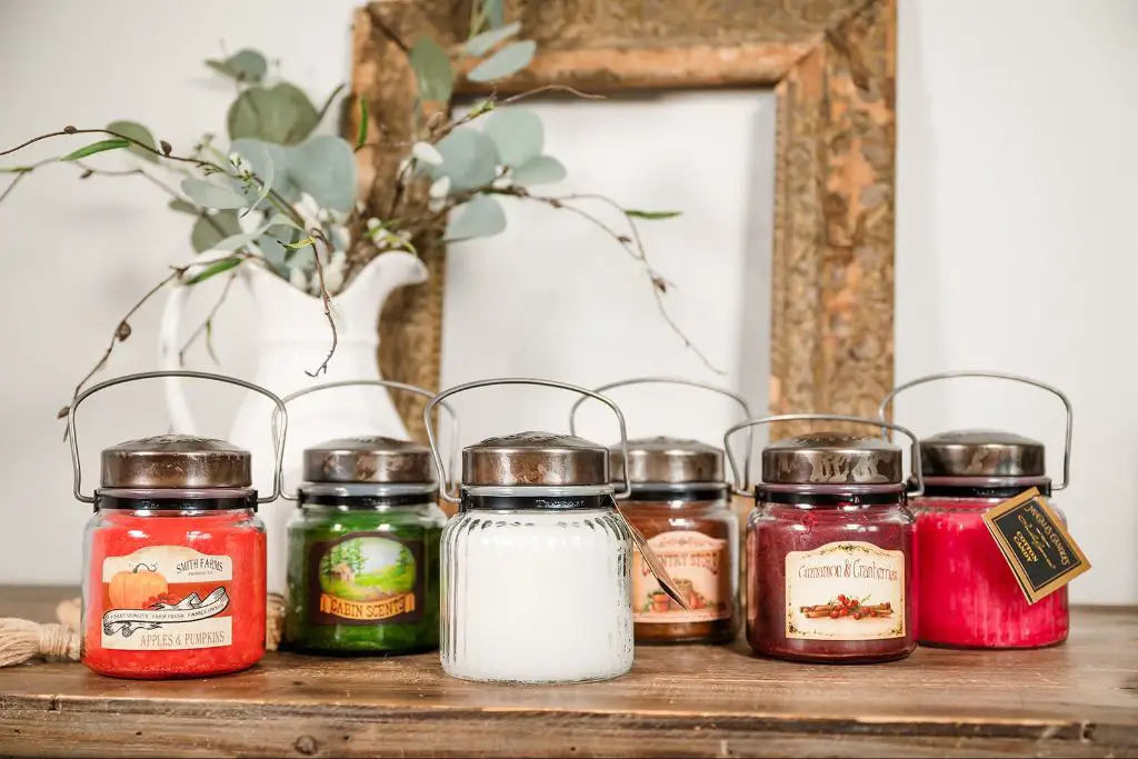 storing finished homemade candles in sealed jars