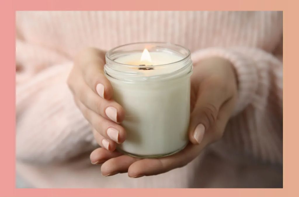 woman holding candles made from paraffin wax