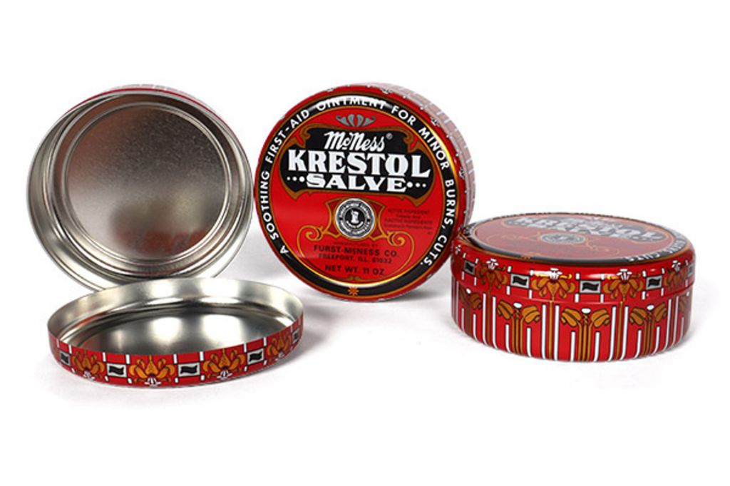 a small tin filled with salve