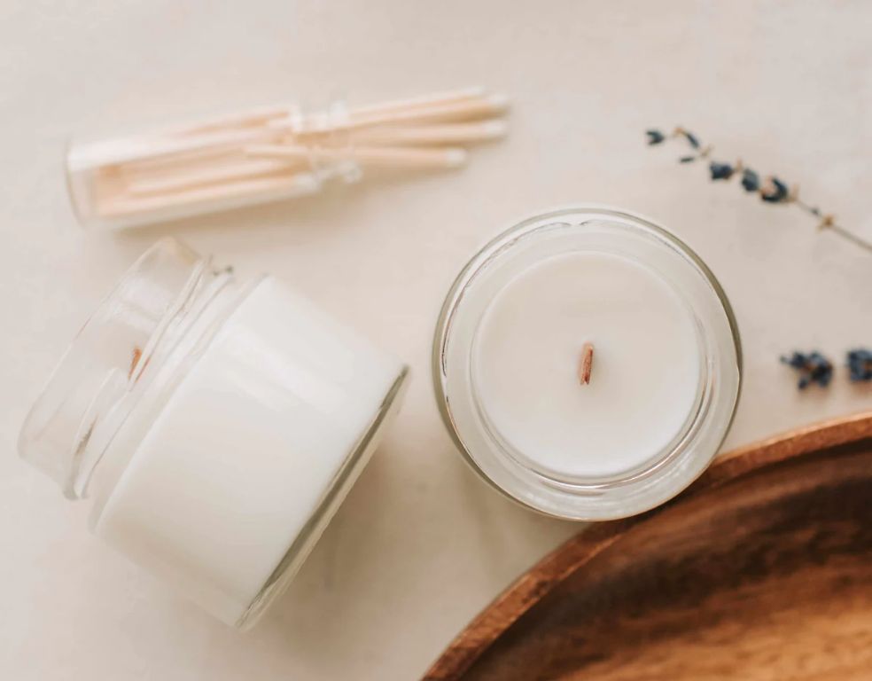 adding essential oils at 10-15% fragrance load works well for soy wax candles.