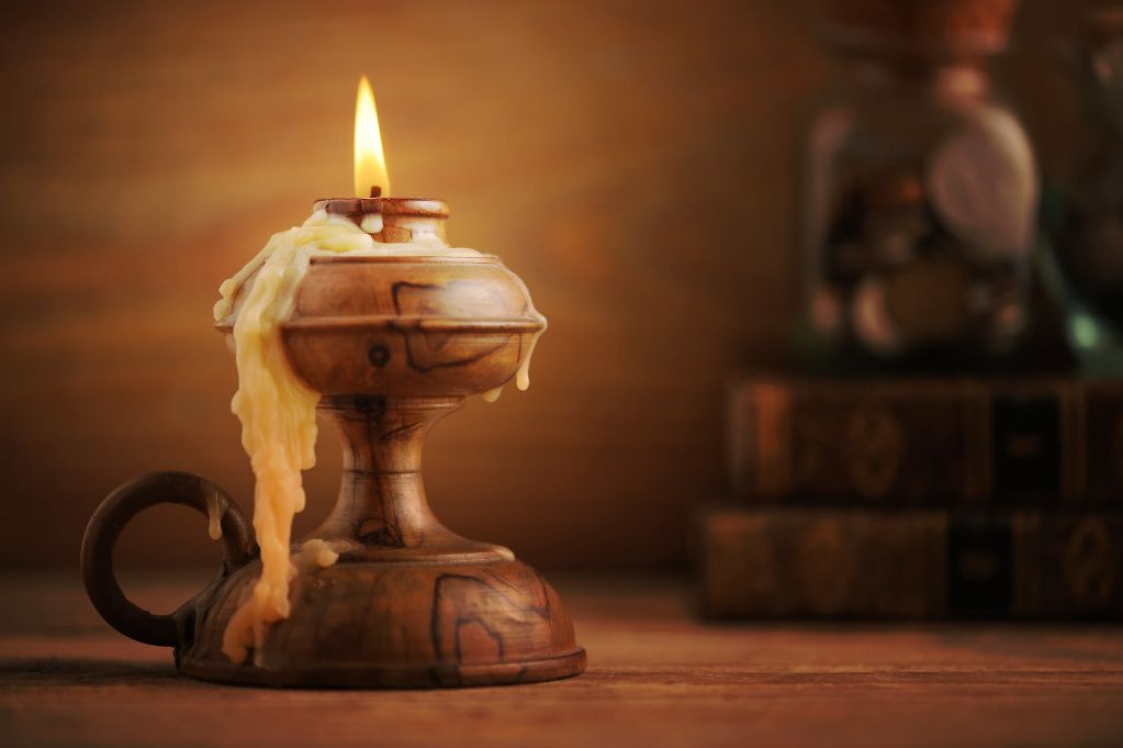 ancient civilizations created early candle-like lighting devices