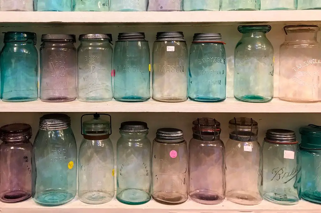 assorted canning jars with different lids