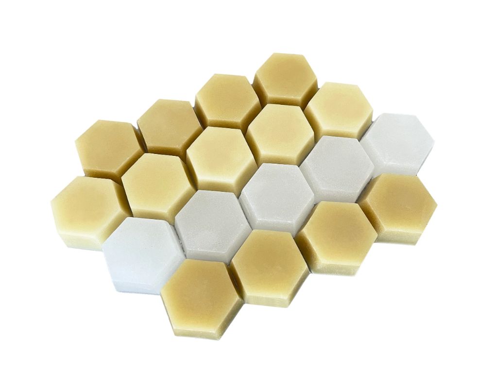 beeswax blocks arranged in honeycomb pattern.