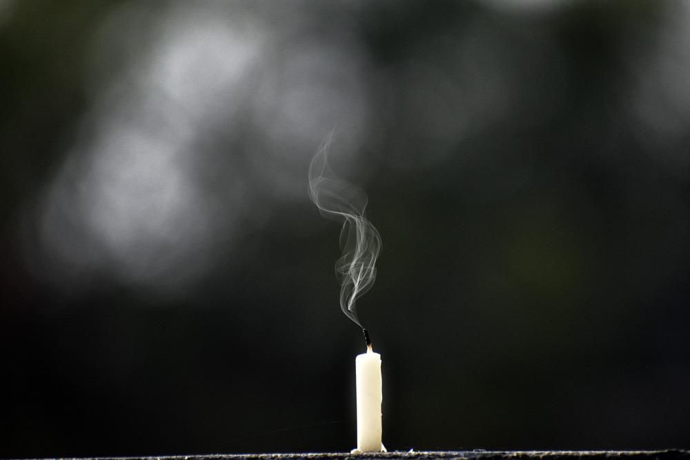 black smoke coming from a candle