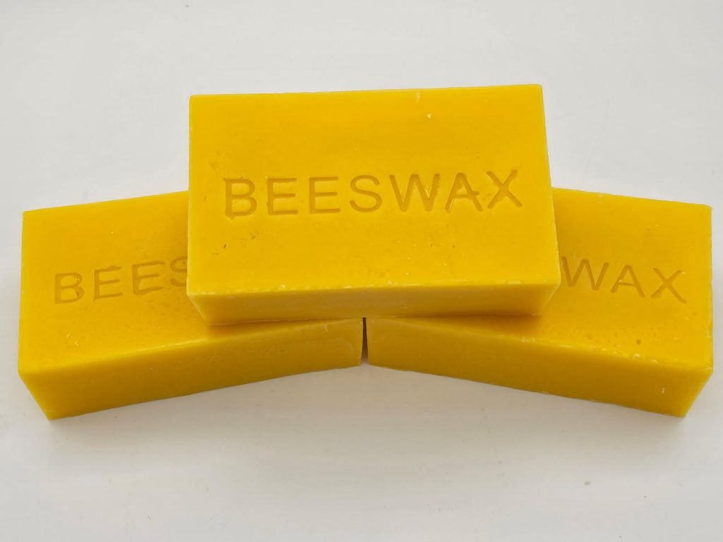 blocks of yellow beeswax, a natural substitute for paraffin wax.