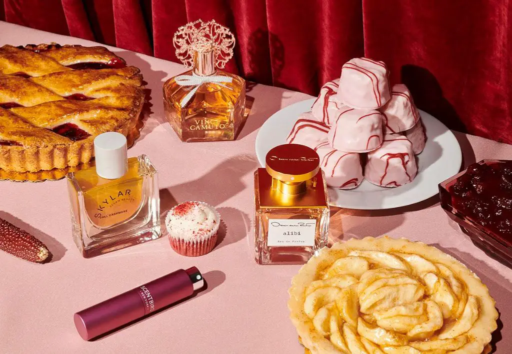 bottles of sweet, gourmand perfumes on a vanity table