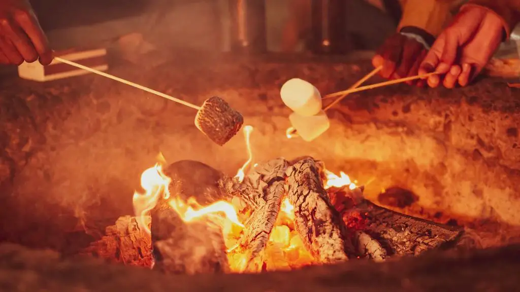 burnt marshmallows cooking over a campfire evoke nostalgic memories and a distinctive sweet aroma.