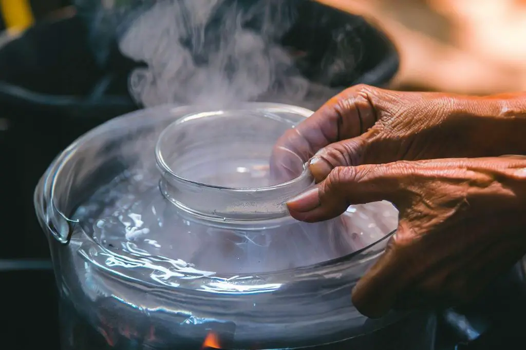 candle wax melting in boiling water