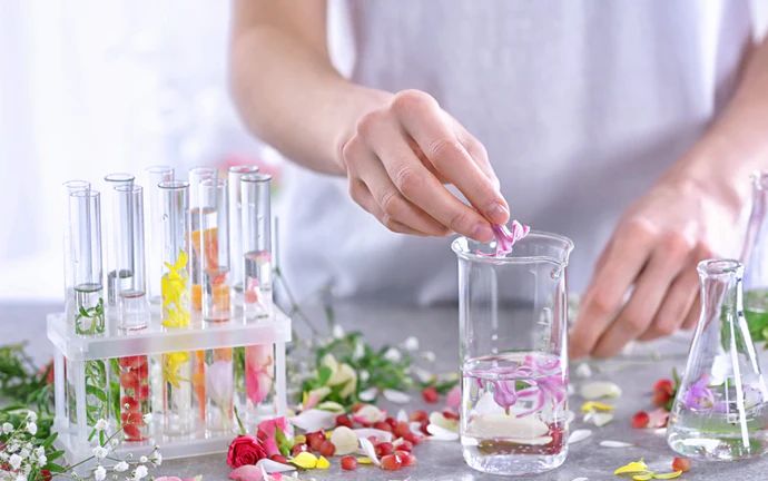 chemist blending fragrance oils