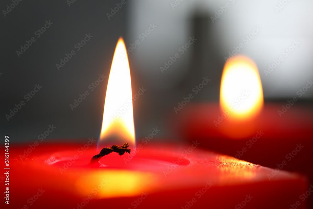 close up of a burning candle wick