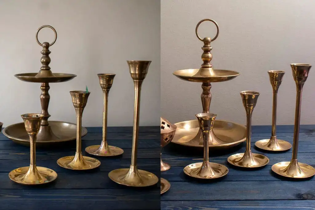 gently cleaning decorative etchings on antique brass candlesticks with a cotton swab.
