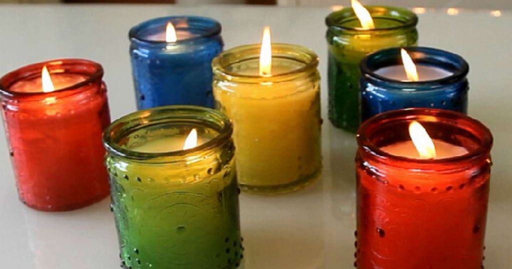 glass jar candles with various colors