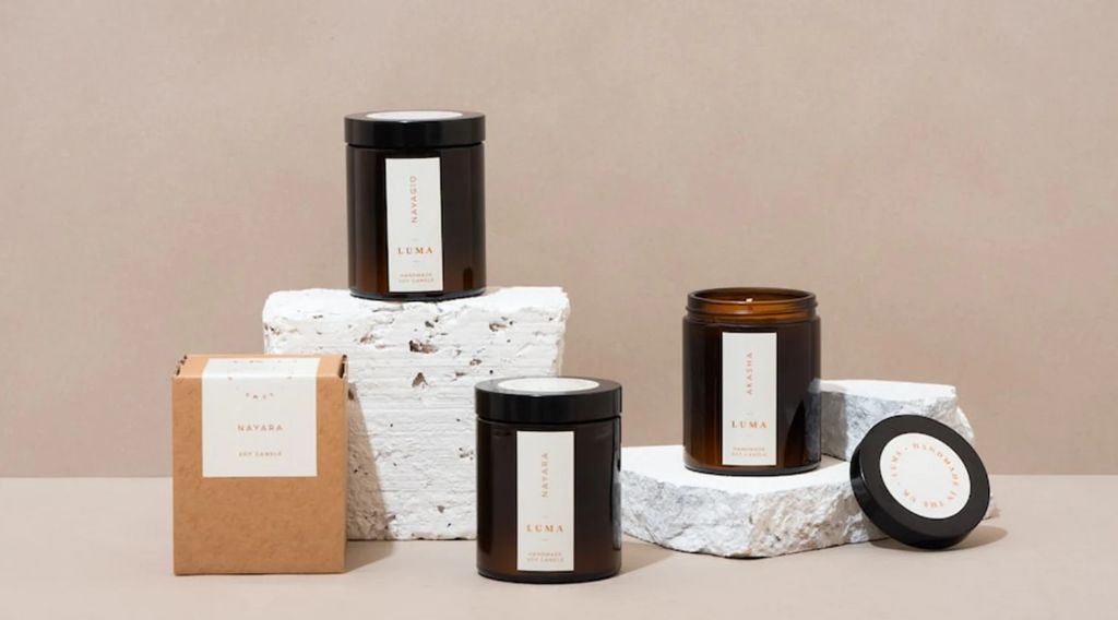 photo of candles with creative packaging designs