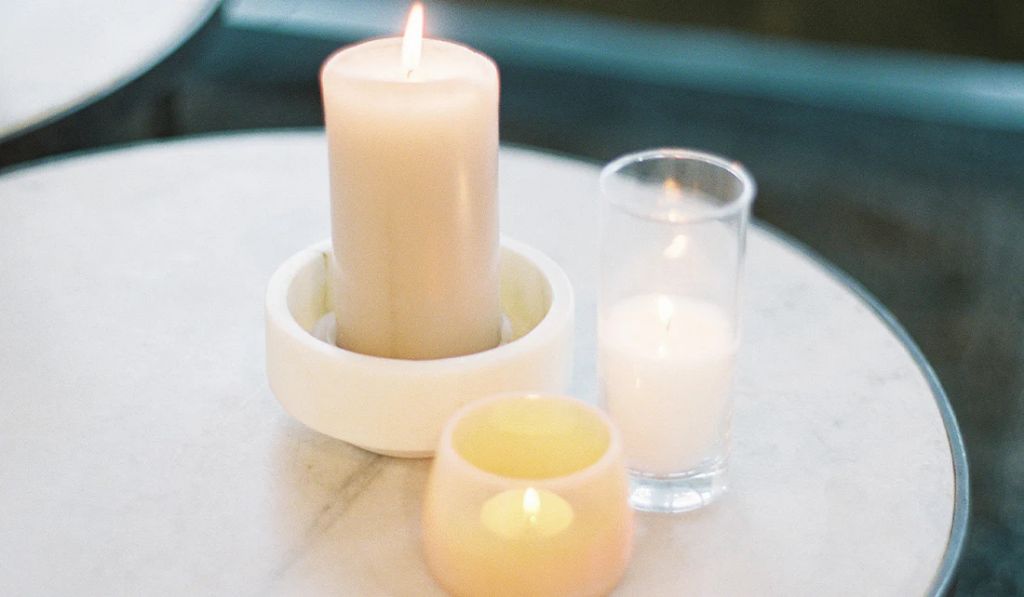 pillar candles are taller while votives are smaller in size.