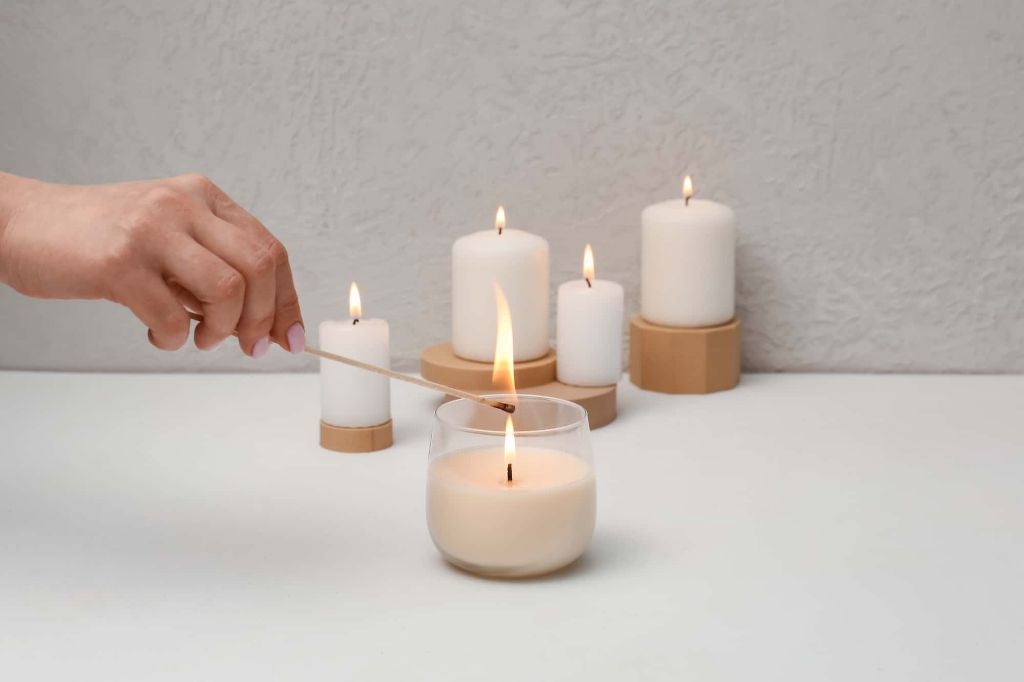 properly pouring wax at the ideal temperature is key for clean pillar candle removal.