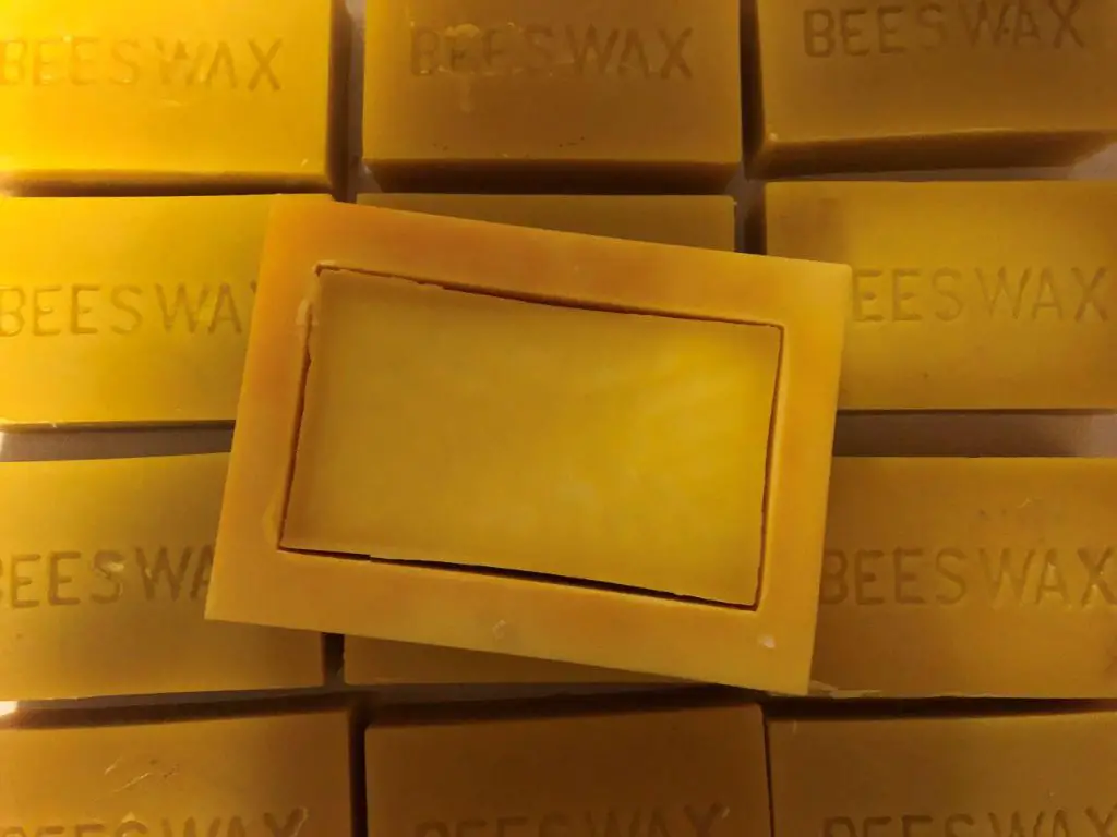 raw beeswax blocks ready to be melted and made into candles.