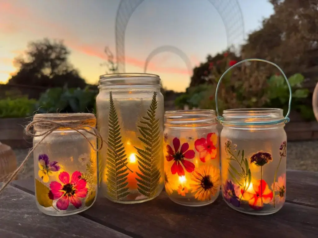 small glass containers used to hold candles