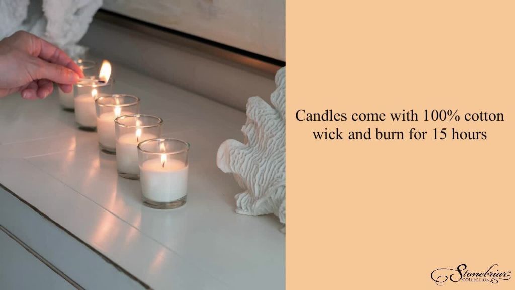 small white votive candles glowing in glass holders.