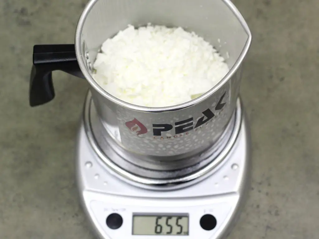 soy wax flakes measured on a digital scale for candle making