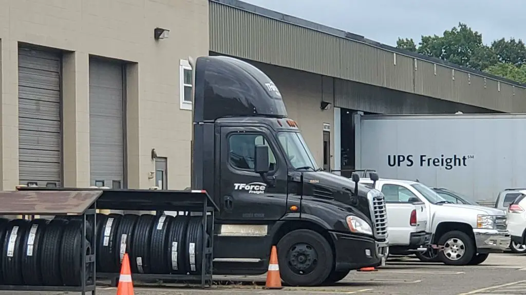 tforce freight truck on highway after company rebranding from ups freight