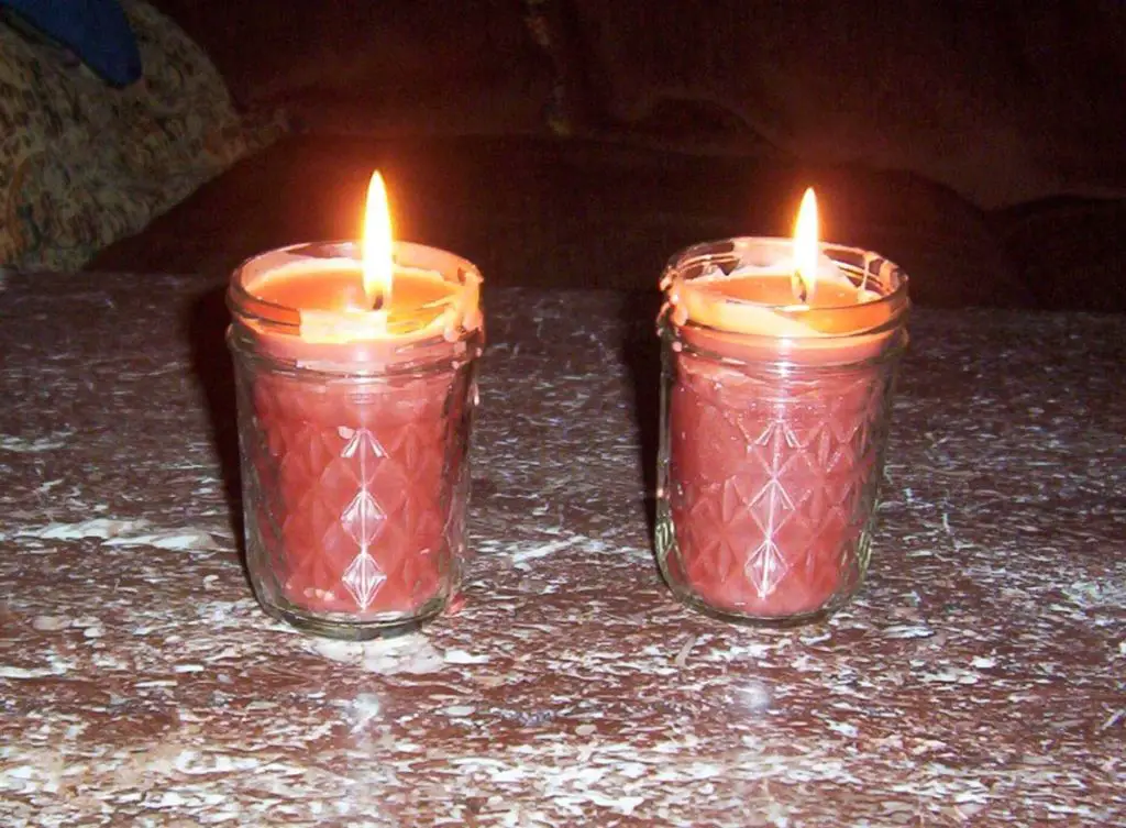 used candle wax can be cleaned, melted, and reused to make new candles