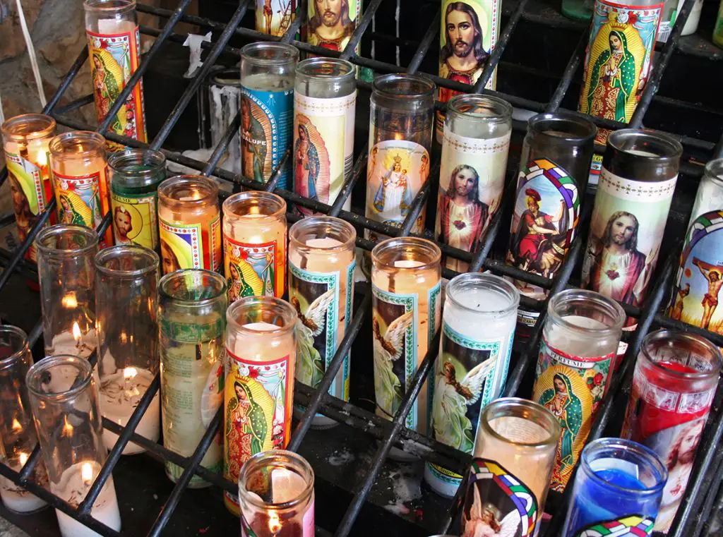 votives hold symbolic meaning in prayer and devotion