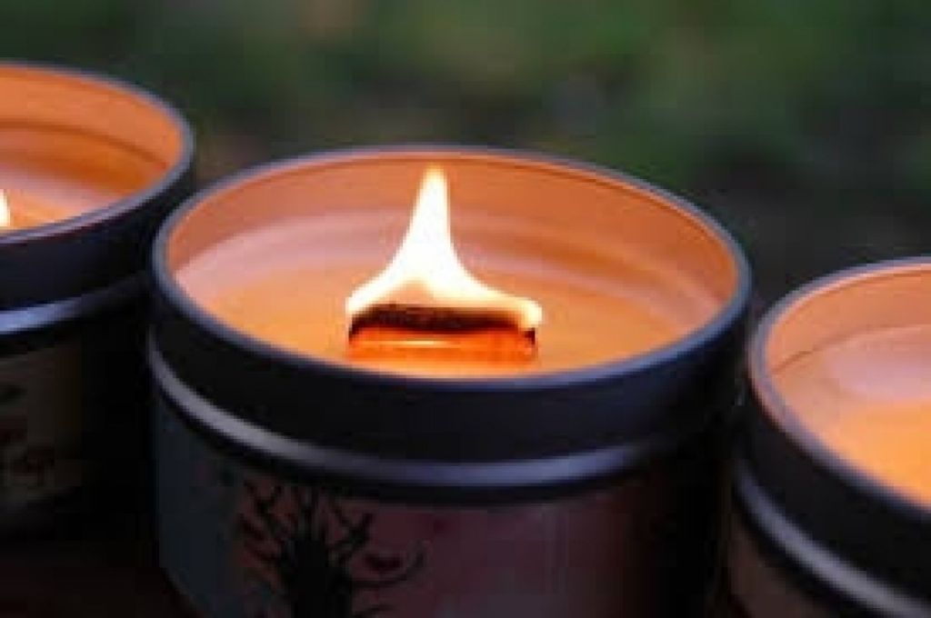 wood wick burning in a candle