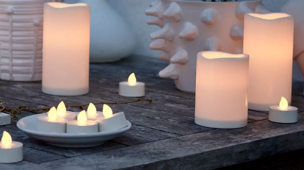 battery candles provide warm light on patios