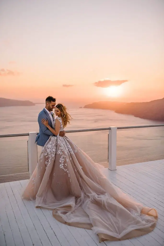 An All-White Wedding Set Against The Santorini Sunset