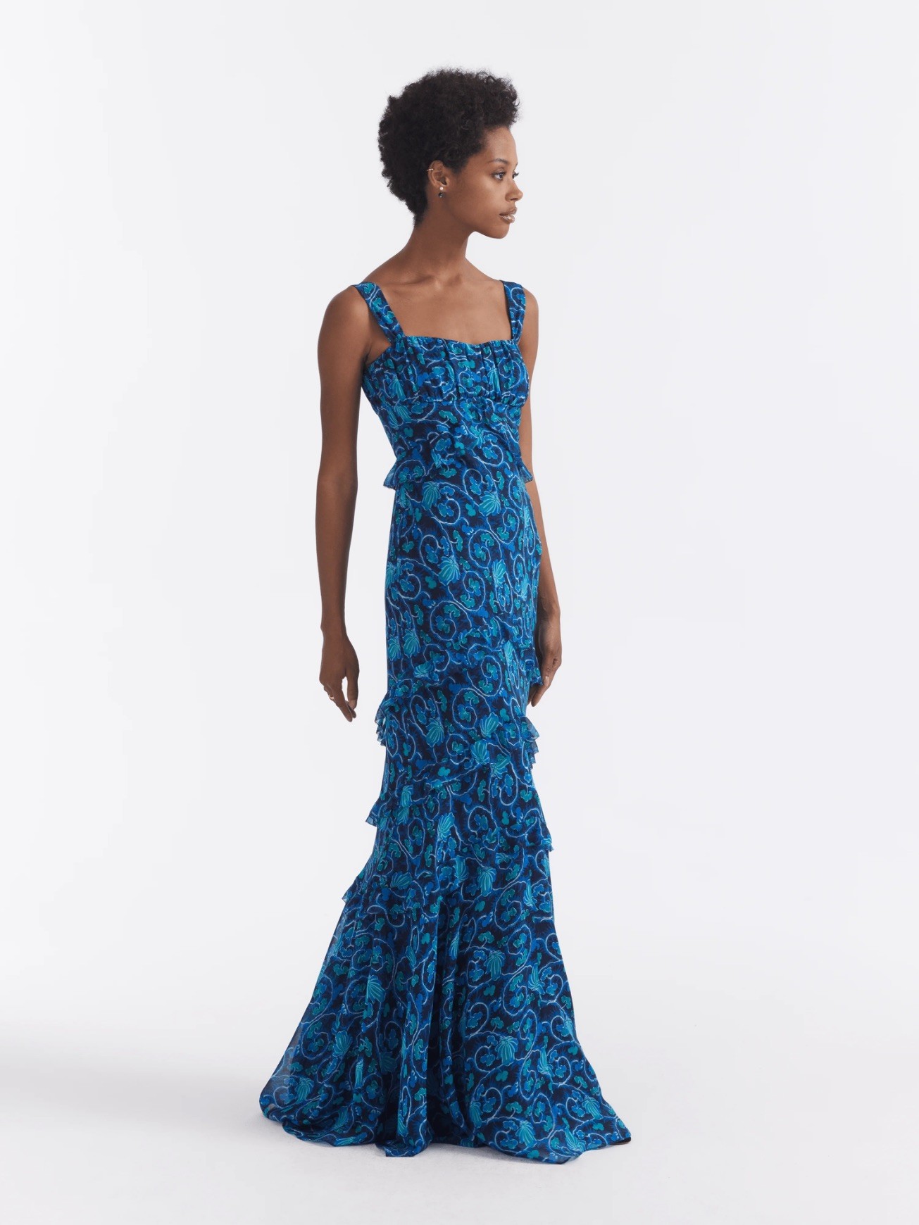 Another print variation: nocturnal blooms, which are simply flowers awash in the blue of night. It’s less of a watercolor print and leans paisley instead, keeping the evening gown fashionable and relaxed.