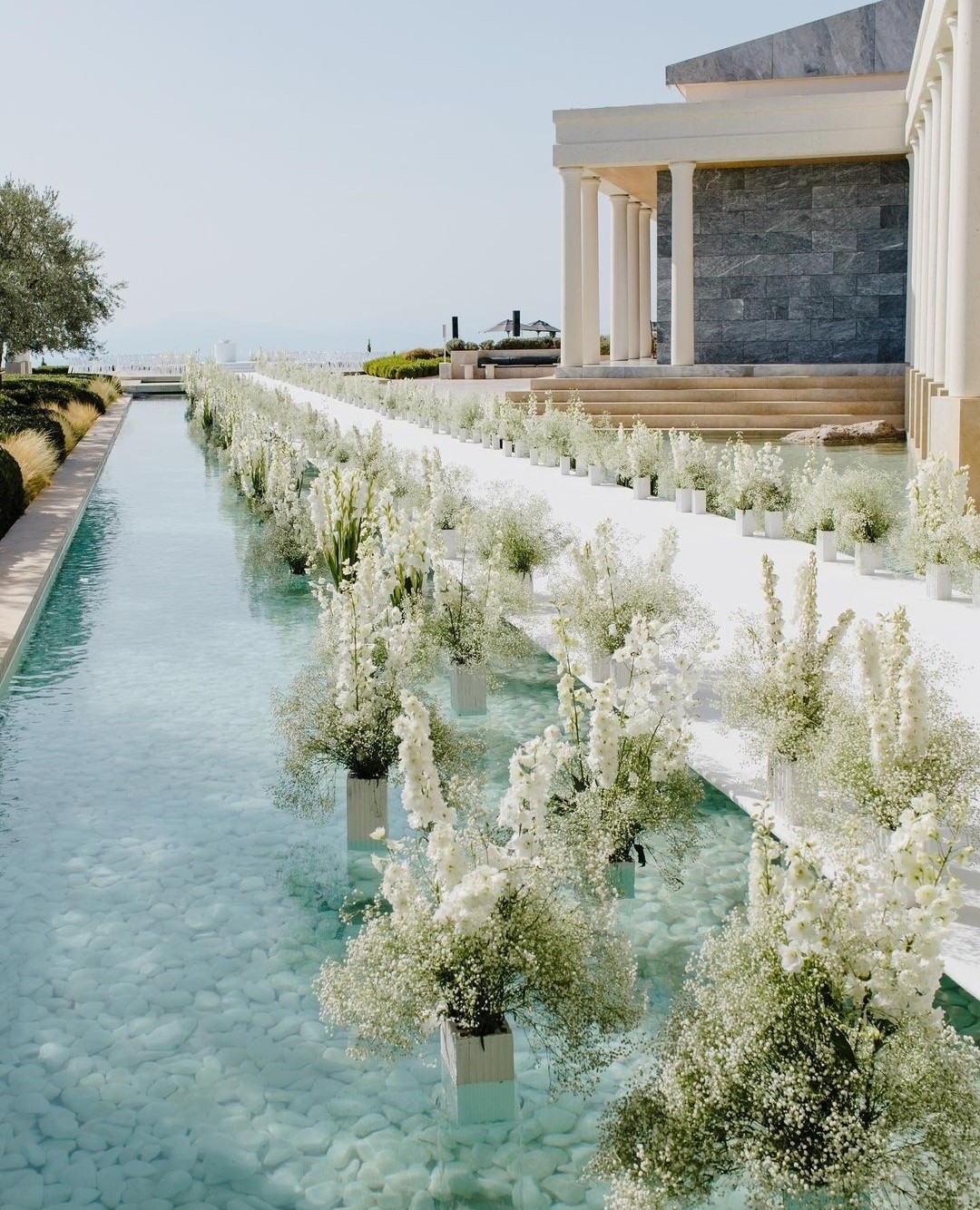 What are the available wedding venues at Amanzoe, Porto Heli?